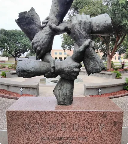 “Synergy” All-America City sculpture in a public plaza